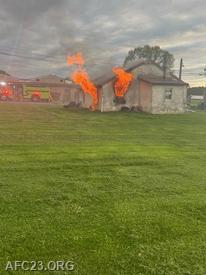 Fire showing from the C/D corner 