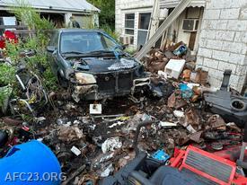 Fire was contained to the engine compartment and was not spread to the building