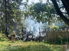 Engine 23-2 crews working on fire suppression on the B/C corner of the shed - 
Photo courtesy of Chester County Working Fires