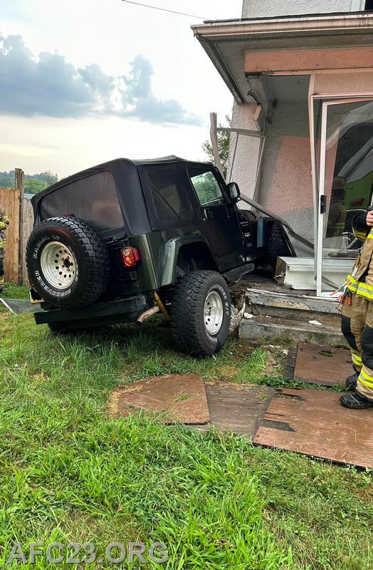 Jeep SUV versus the front porch