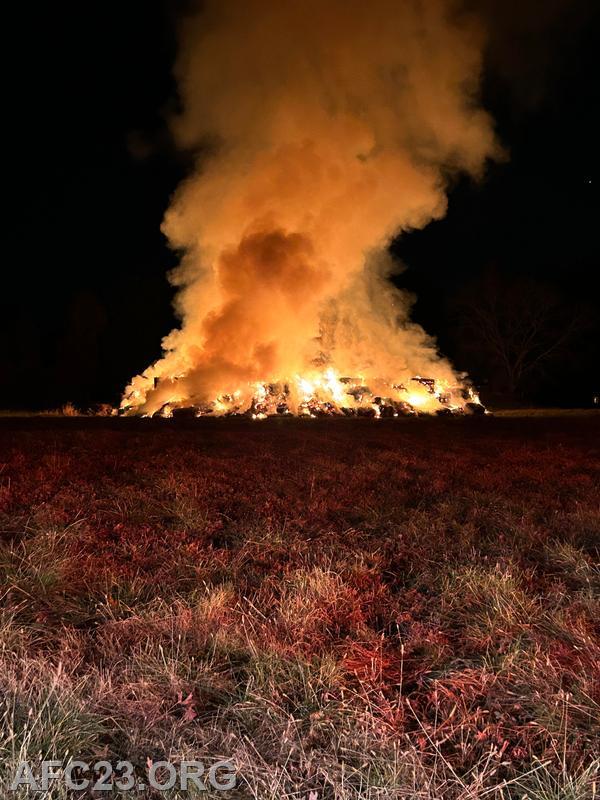 Crews arrived to find four rows of haybales fully engulfed 