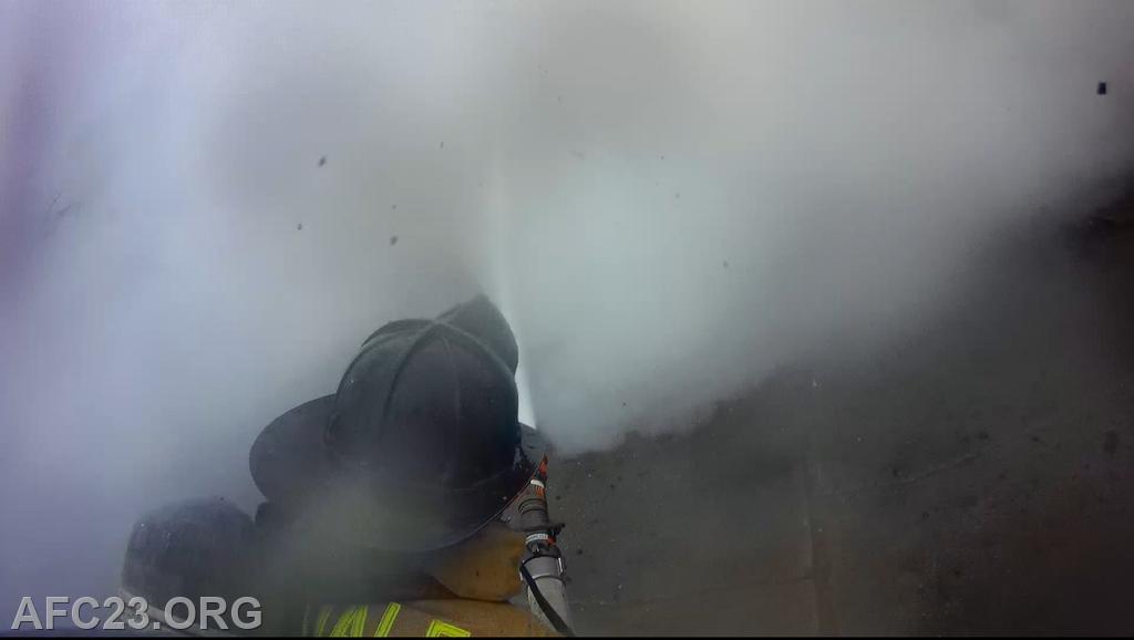 *View from Hoseman Owen helmet cam*

FF/EMT Dowling knocking down fire with a 2 1/2" handline.